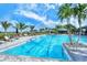 Large community pool with plenty of lounge chairs at 5552 Eagle Creek Rd, Sarasota, FL 34238