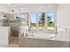 Spa-like bathroom with soaking tub and walk-in shower at 5902 Red Mangrove Ln, Bradenton, FL 34210