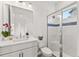 Modern bathroom with walk-in shower and white vanity at 5902 Red Mangrove Ln, Bradenton, FL 34210