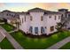 Stunning two-story home with unique architectural details and manicured lawn at 5902 Red Mangrove Ln, Bradenton, FL 34210