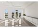 Sunlit living area with built-in cabinetry and large windows at 5902 Red Mangrove Ln, Bradenton, FL 34210