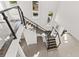 Modern staircase with glass and metal railings at 5902 Red Mangrove Ln, Bradenton, FL 34210