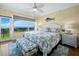 Bright bedroom with water views and king-size bed at 603 Longboat Club Rd # 1102N, Longboat Key, FL 34228