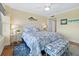 Main bedroom with a king-size bed and blue decor at 603 Longboat Club Rd # 1102N, Longboat Key, FL 34228