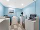 Convenient laundry room with washers and dryers at 603 Longboat Club Rd # 1102N, Longboat Key, FL 34228