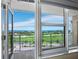 Waterfront view from bedroom featuring golf course at 603 Longboat Club Rd # 1102N, Longboat Key, FL 34228