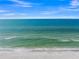 Clear ocean and sandy beach at 605 Jungle Queen Way, Longboat Key, FL 34228