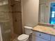 Bathroom with a walk-in shower and updated vanity at 6085 Clubside Dr # 7682, Sarasota, FL 34243