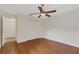 Spacious bedroom featuring wood floors and ample closet space at 6085 Clubside Dr # 7682, Sarasota, FL 34243