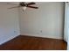 Spacious bedroom with hardwood floors and ceiling fan at 6085 Clubside Dr # 7682, Sarasota, FL 34243