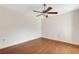 Bright bedroom with wood floors and ceiling fan at 6085 Clubside Dr # 7682, Sarasota, FL 34243