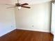 Spacious bedroom with hardwood floors and ceiling fan at 6085 Clubside Dr # 7682, Sarasota, FL 34243