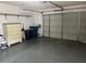 Garage with ample storage space, washer, dryer, and room for a car at 6085 Clubside Dr # 7682, Sarasota, FL 34243