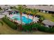 Community pool and spa with surrounding lounge chairs at 6085 Clubside Dr # 7682, Sarasota, FL 34243