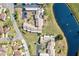 Aerial view of community near a pond and surrounding landscape at 6131 Heritage Ln # 6131, Bradenton, FL 34209