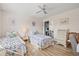 Guest bedroom with twin beds, dresser, and plenty of natural light at 6131 Heritage Ln # 6131, Bradenton, FL 34209