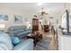 Spacious living room featuring a comfortable sectional sofa and large TV at 6131 Heritage Ln # 6131, Bradenton, FL 34209