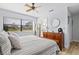 Spacious main bedroom with large window and updated flooring at 6131 Heritage Ln # 6131, Bradenton, FL 34209