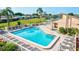 Relaxing community pool with plenty of lounge chairs at 6131 Heritage Ln # 6131, Bradenton, FL 34209