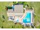 Top-down view of community pool, hot tub, and clubhouse at 6131 Heritage Ln # 6131, Bradenton, FL 34209