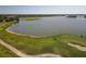 Aerial view of lakefront property and golf course at 6310 Watercrest Way # 201, Lakewood Ranch, FL 34202