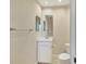 Small half bathroom with a toilet and sink at 6310 Watercrest Way # 201, Lakewood Ranch, FL 34202