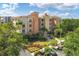 Luxury condo building with lake views and lush landscaping at 6310 Watercrest Way # 201, Lakewood Ranch, FL 34202