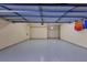 Spacious garage with high ceilings and ample storage at 6310 Watercrest Way # 201, Lakewood Ranch, FL 34202