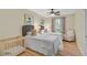 Bedroom with two twin beds and access to bathroom at 662 Fernwalk Ln, Osprey, FL 34229