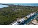 Aerial view of waterfront homes and canal at 713 Saint Judes S Dr # 2, Longboat Key, FL 34228