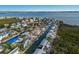 Aerial view of neighborhood, waterfront property and canal at 713 Saint Judes S Dr # 2, Longboat Key, FL 34228