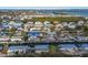 Aerial view of neighborhood, waterfront property and canal at 713 Saint Judes S Dr # 2, Longboat Key, FL 34228