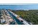 Aerial view of neighborhood, waterfront property and canal at 713 Saint Judes S Dr # 2, Longboat Key, FL 34228