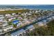 Aerial view of neighborhood, waterfront property and canal at 713 Saint Judes S Dr # 2, Longboat Key, FL 34228