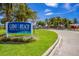 Lido Beach Pool & Pavilion community pool with lounge chairs and sunny skies at 713 Saint Judes S Dr # 2, Longboat Key, FL 34228