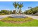 St. Armands Key entrance sign with lush landscaping at 713 Saint Judes S Dr # 2, Longboat Key, FL 34228