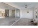 Florida room with sliding doors and water views at 713 Saint Judes S Dr # 2, Longboat Key, FL 34228