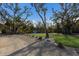 Park area with grassy lawn and gravel path at 713 Saint Judes S Dr # 2, Longboat Key, FL 34228