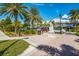 St. Armands Circle features a statue and palm trees at 713 Saint Judes S Dr # 2, Longboat Key, FL 34228