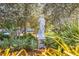 A statue in a garden setting in St. Armands Circle at 713 Saint Judes S Dr # 2, Longboat Key, FL 34228