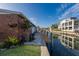 Brick home with private dock and canal views at 713 Saint Judes S Dr # 2, Longboat Key, FL 34228