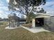 View of garage and shed from the backyard at 7564 Joppa St, North Port, FL 34287