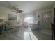 Living room with large window and wood-look flooring at 7564 Joppa St, North Port, FL 34287