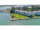 Aerial view of waterfront property with lush landscaping and canal access at 777 John Ringling Blvd # 2, Sarasota, FL 34236