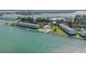 Aerial view of waterfront community with pool and boat docks at 777 John Ringling Blvd # 2, Sarasota, FL 34236