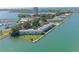 Aerial view of waterfront property with lush landscaping and marina at 777 John Ringling Blvd # 2, Sarasota, FL 34236