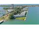 Aerial view showcasing waterfront community, pool, and boat slips at 777 John Ringling Blvd # 2, Sarasota, FL 34236