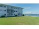 Building exterior showcasing balconies and waterfront views at 777 John Ringling Blvd # 2, Sarasota, FL 34236