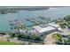 Luxury marina with numerous yachts and waterfront clubhouse at 777 John Ringling Blvd # 2, Sarasota, FL 34236