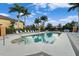 Resort-style pool with plenty of lounge chairs at 7803 Grand Estuary Trl # 102, Bradenton, FL 34212